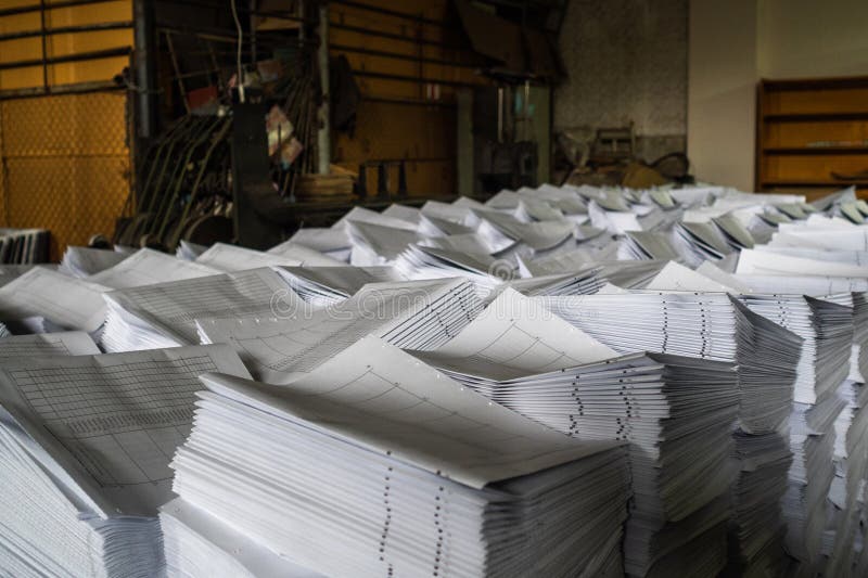 large-amount-paper-pile-products-production-shop-printing-house-170265761.jpg