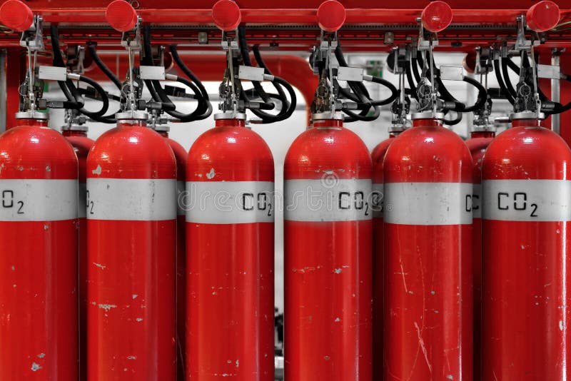 Large CO2 fire extinguishers in a power plant royalty free stock photo