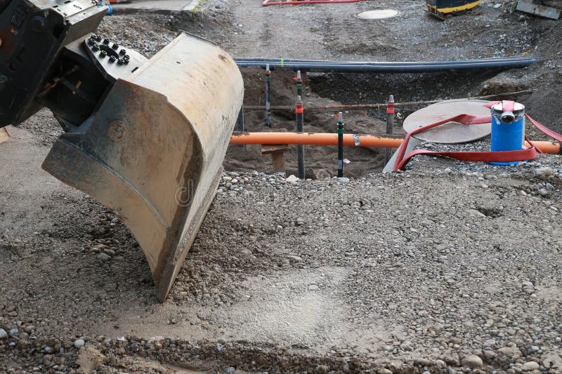 Large construction site with a large shovel digging into the ground stock photography