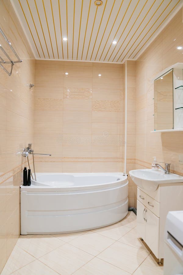 Large corner bath in a spacious bathroom stock photo