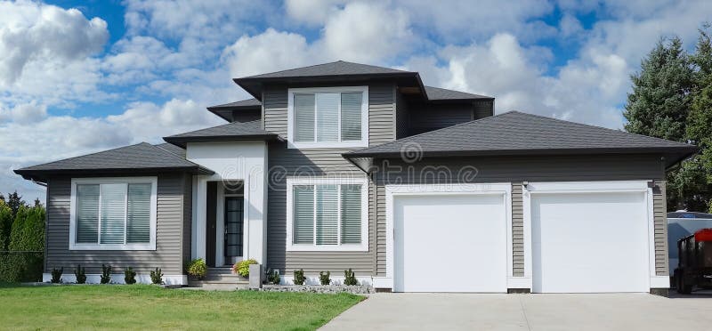 Enormous Modern Luxury Real Estate Home House Maison Stucco Siding Exterior  Cloudy Sky Background Stock Image - Image Of Canada, Blue: 237911837