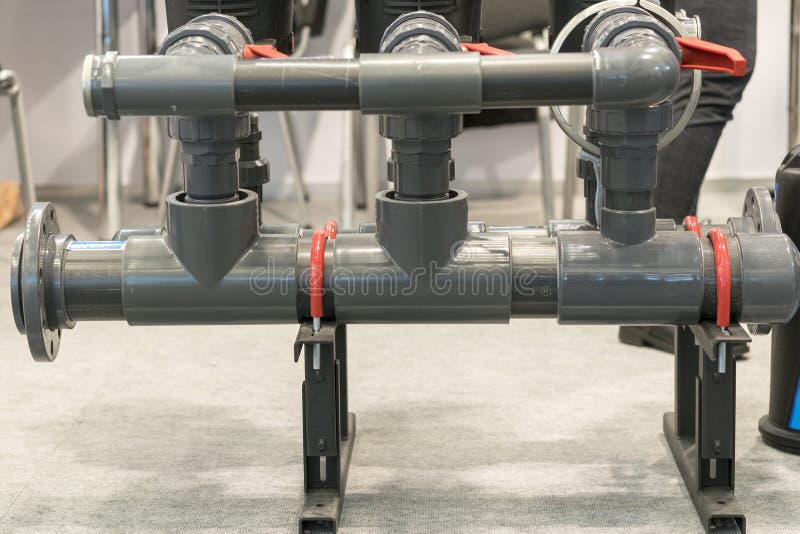 Large Diameter Plastic Fitting. Examples of Joining Plastic Pipes Stock