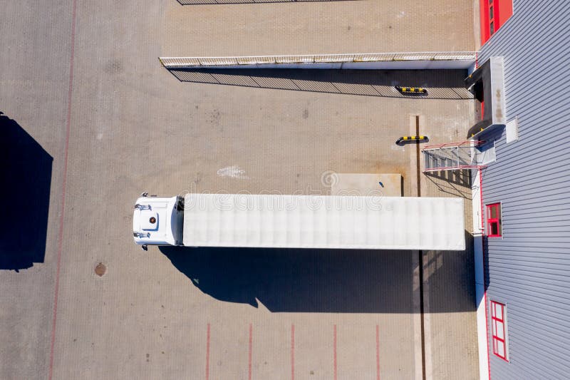 Large Distribution Hub, Trucks and Trailers. Aerial View Stock Photo Image of facade