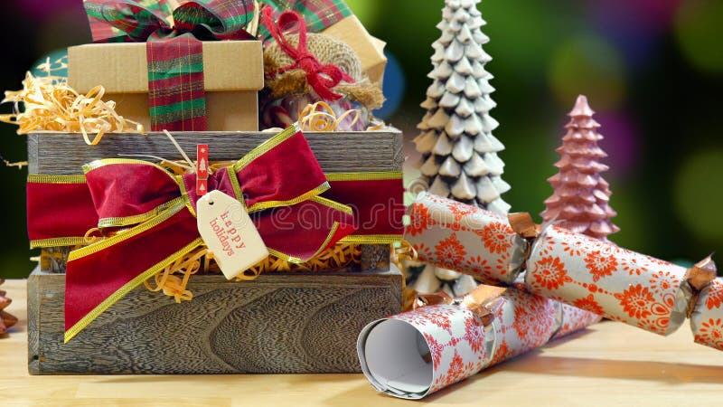 Large English style traditional Christmas hamper with wrapped gifts and food.