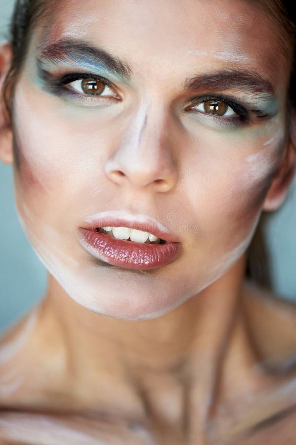 Large-face Portrait.Interesting Makeup with Paint Strokes. Look ...