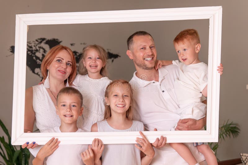 Large Family Holding Picture Frame Stock Photo Image of happiness, holding 210758270