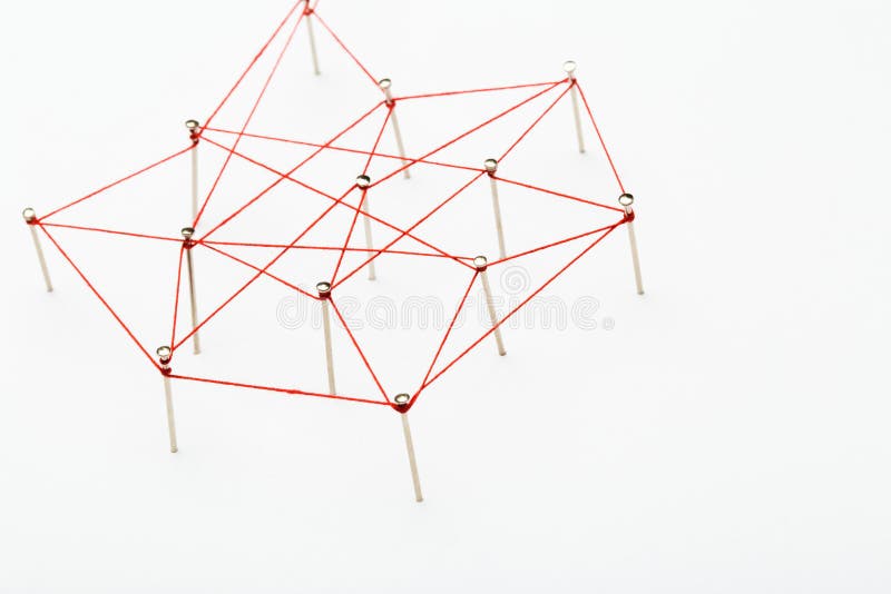 A large grid of pins connected with string. Communication, network concept