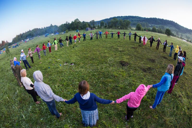 Large group of happy peoples play roundelay royalty free stock photography Large group of happy peoples play roundelay royalty free stock photography