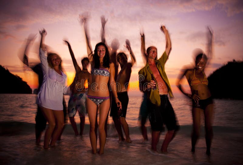 Large group of young people enjoying a beach party royalty free stock images Large group of young people enjoying a beach party royalty free stock images