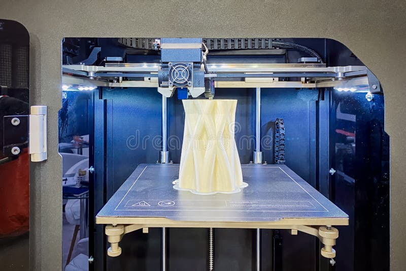 Large industrial 3D printer prints an abstract figure stock images