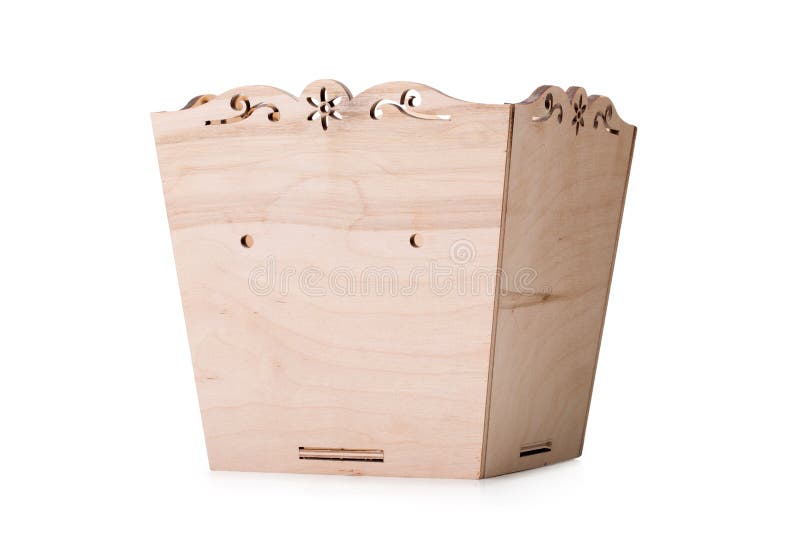 An opened box for multicolored toys, blocks and cubes, isolated on a white background. A wooden chest for playthings.