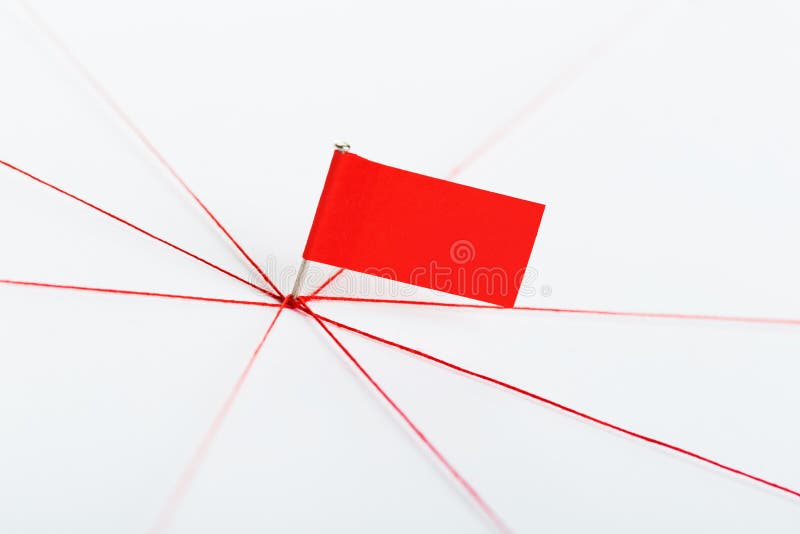 A large mesh of pins tied together with a red cord. Communication, network concept