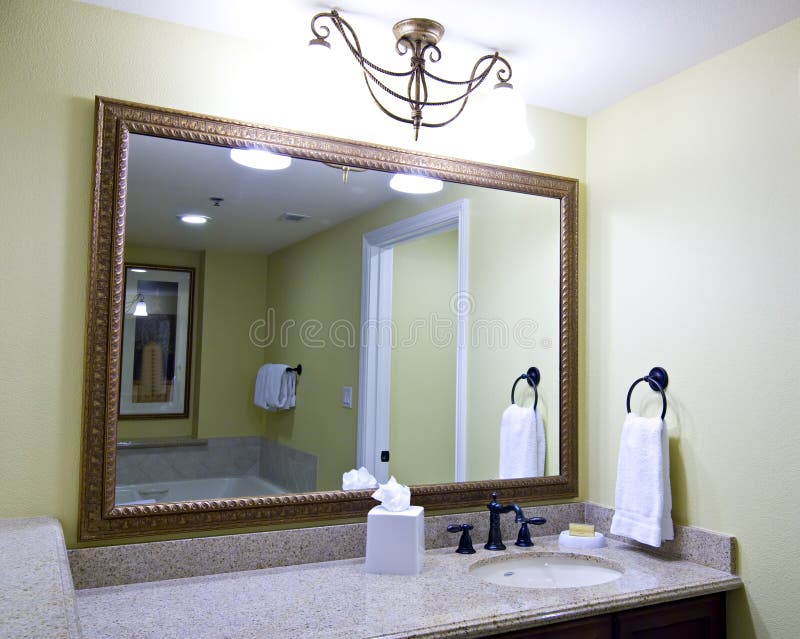 Large mirror above sink