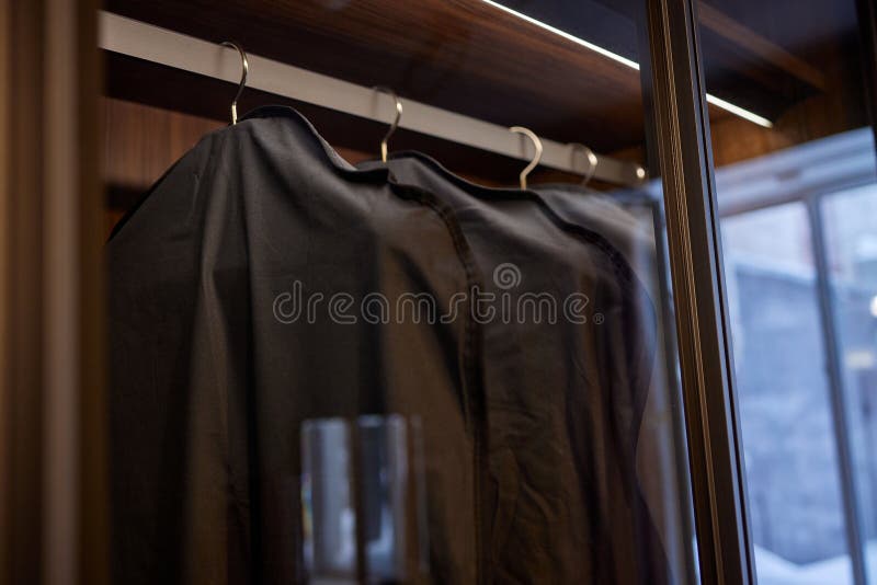 Large Modern Builtin with Matte Glass on Sliding Doors Stands