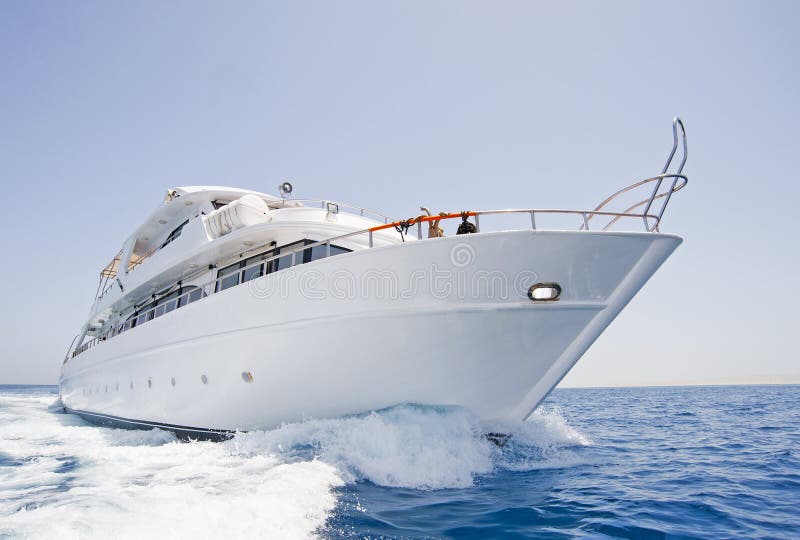 Large motor yacht under way at sea
