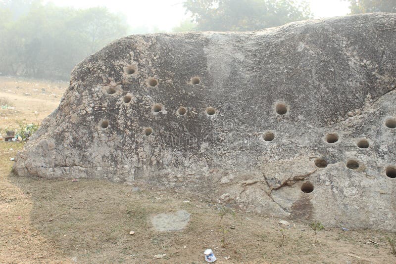 Large mountain rock close and partial view under daylight. royalty free stock images