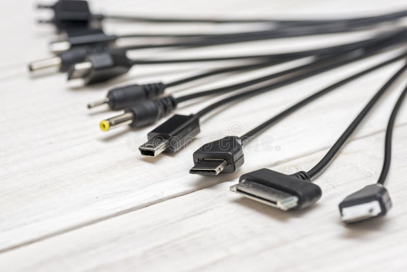 A large number of different connectors for connecting various gadgets via USB port to a laptop or computer. The concept of stock photography A large number of different connectors for connecting various gadgets via USB port to a laptop or computer. The concept of stock photography