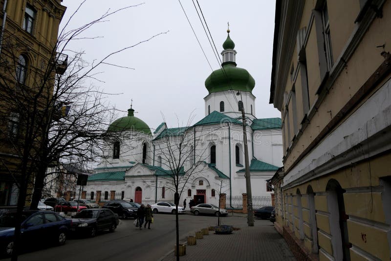 A large Orthodox church of white color with a green roof, which is located in the historical part of the big city. A large Orthodox church of white color with a green roof, which is located in the historical part of the big city.