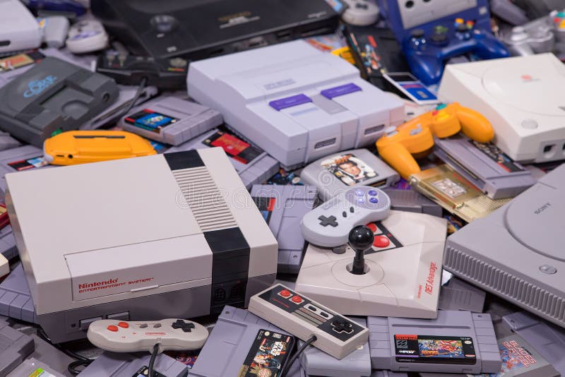 A Large Pile of Retro Video Games and Systems
