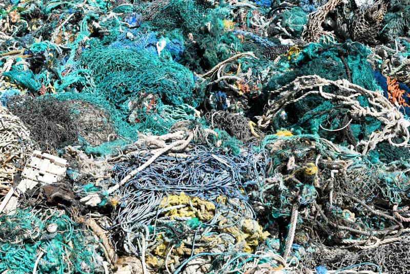 A Large Pile of Trawler Fishing Nets, Ropes and Debris Dredged Up from the  Port of Los Angeles. Fishing Nets are a Major Source Stock Image - Image of  nautical, large: 256752299