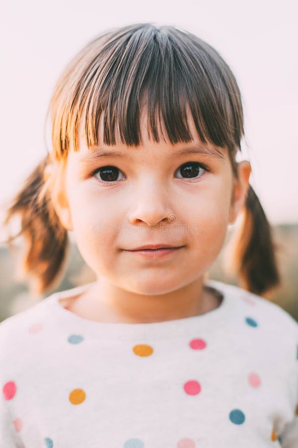A Large Portrait of a Little Girl of 3 Years Old with Brown Eyes, Dark Blond Hair, with Two Tails, in a Light Sweater Stock Image - Image of childhood, looks: 199065591 A Large Portrait of a Little Girl of 3 Years Old with Brown Eyes, Dark Blond Hair, with Two Tails, in a Light Sweater Stock Image - Image of childhood, looks: 199065591
