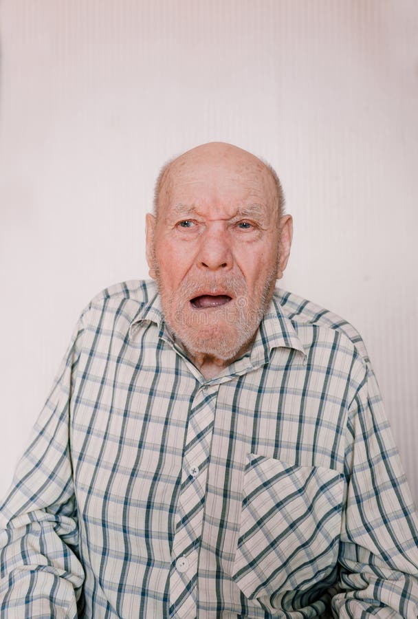 A Large Portrait Of An Old Man On A Light Background With Deep Wrinkles