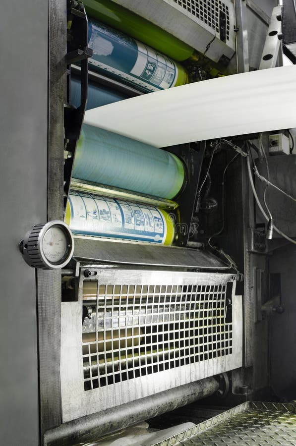 Large Print Offset machine rollers and roll of paper stock photos