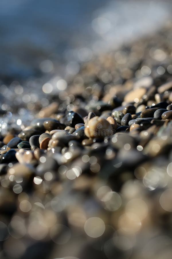 Large quantities of wet pebbles
