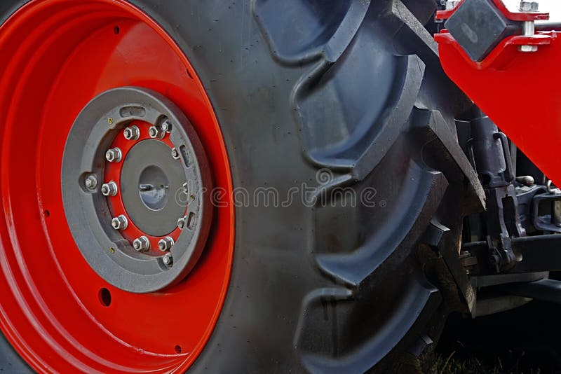 Large red wheel rim with rubber