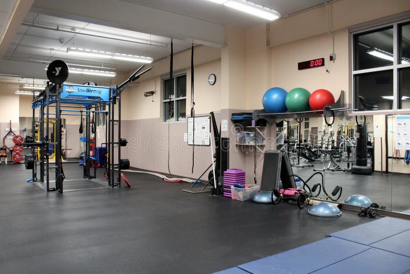 Large airy room filled with equipment for people who work out in the gym, Saratoga Springs, New York, 2019 stock photography Large airy room filled with equipment for people who work out in the gym, Saratoga Springs, New York, 2019 stock photography