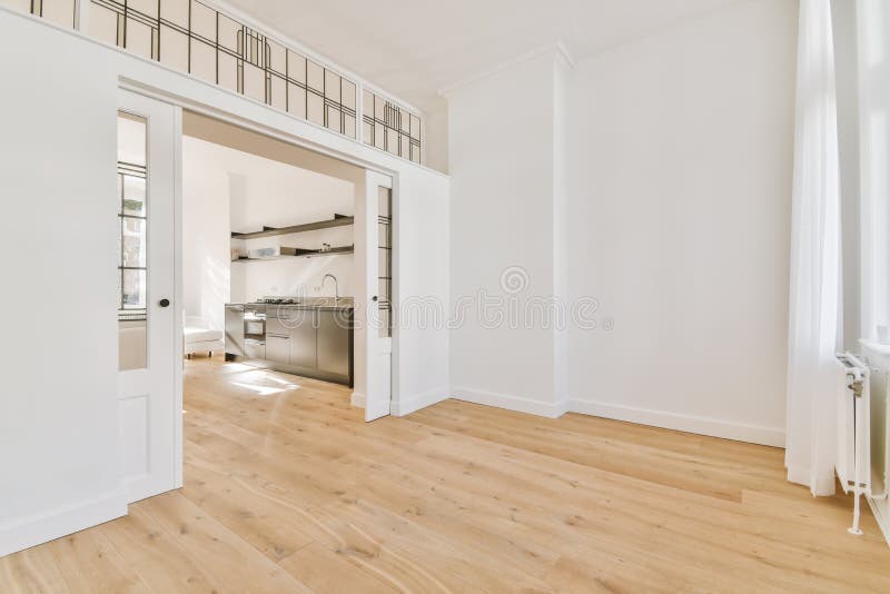 Large Room with Glass Patterned Doors Stock Image - Image of estate