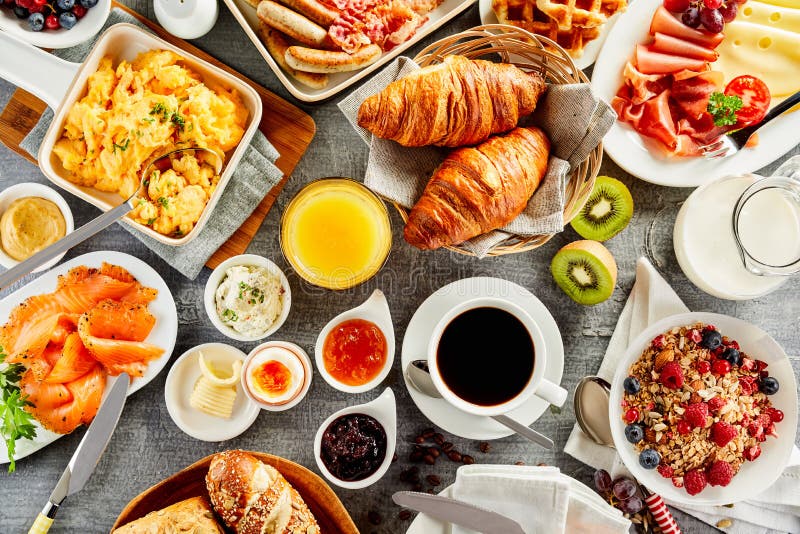 Large selection of breakfast food on a table