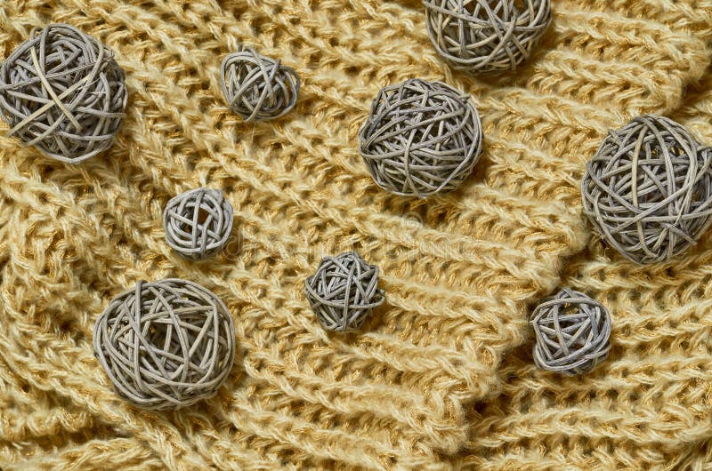 brown knitted fabric with large knitting needles Stock Photo