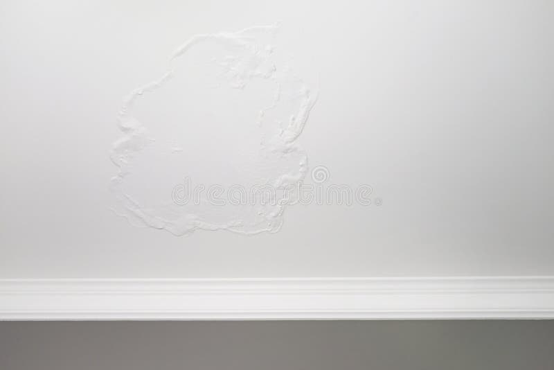 Large Spots and Cracks on the Bathroom Ceiling after Flooding Stock