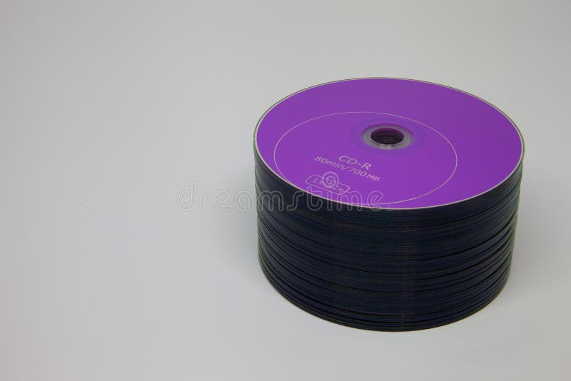 Large stack of purple cd disks royalty free stock photography Large stack of purple cd disks royalty free stock photography