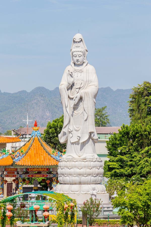 A Large Statue of Guanyin Buddha. Stock Photo Image of leaf, roof