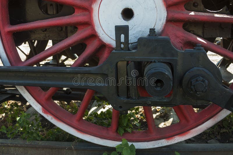 Large steel wheels of old steam locomotive red with white outline stock images Large steel wheels of old steam locomotive red with white outline stock images