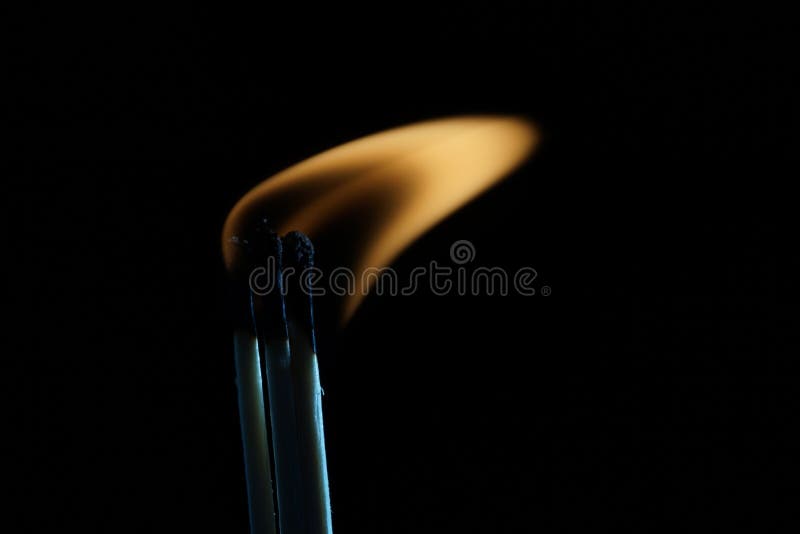 Large Striking Matches Lighter with Its Flame Showing Stock Image