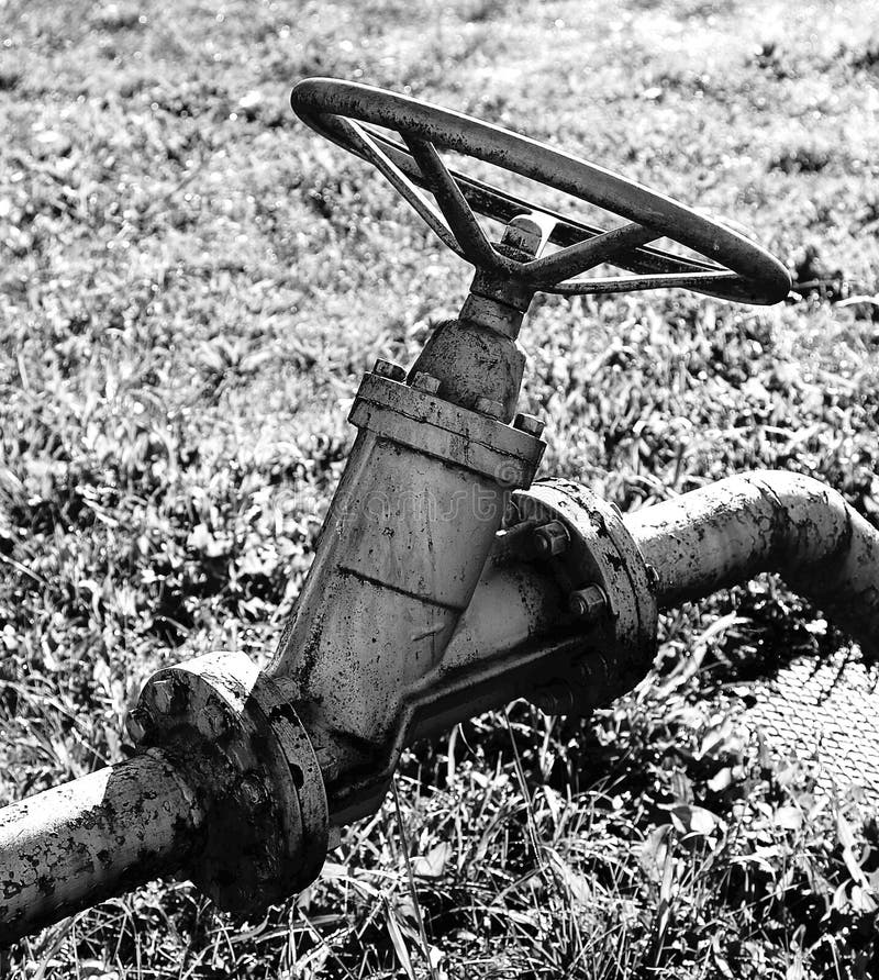 Tap with Pipe Closure Valve in a Large Industrial Plant Stock Photo