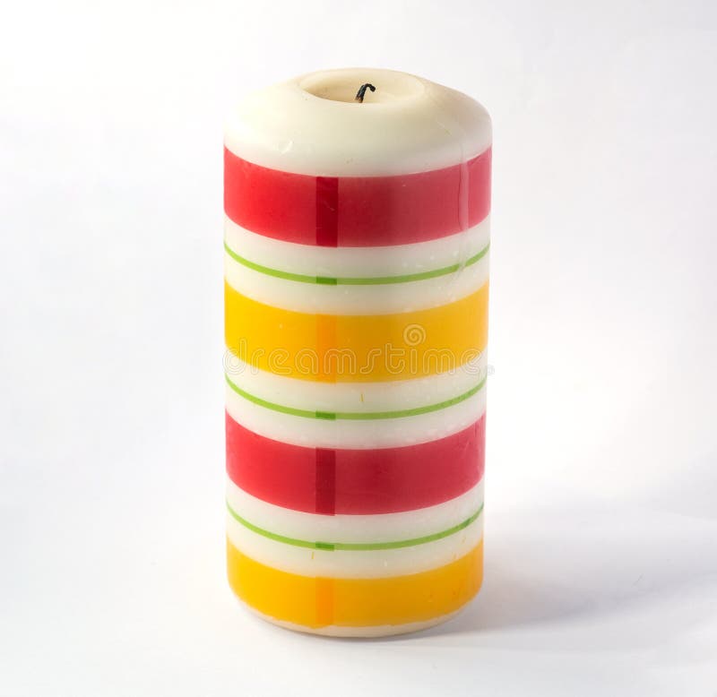 Large Thick Candle with Colored Horizontal Stripes Isolated on a White