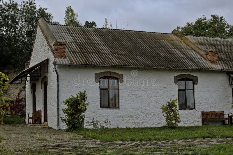 Large traditional whitewashed red brick house. royalty free stock photography