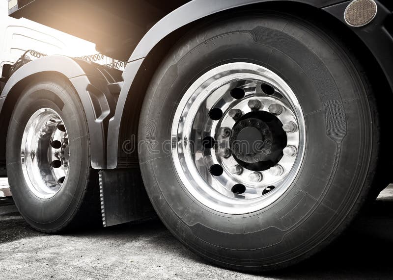 Rear of Semi Truck Wheels Tires. Diesel Truck. Freight Trucks Transport