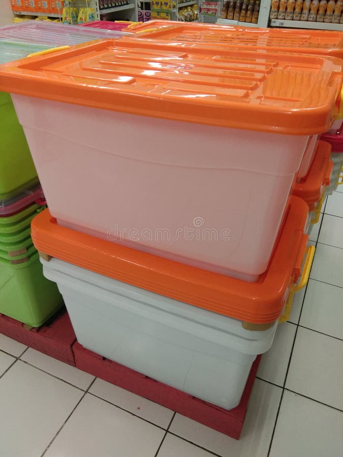 A Large Tupperware Box for Storing Various Items Stock Photo