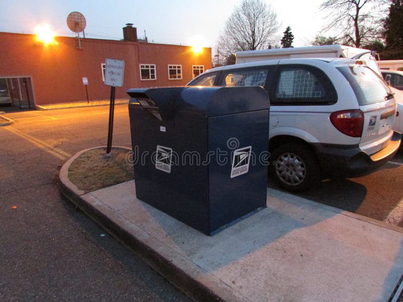 USPS Mail Delivery Trucks with Logo in Edison, NJ USA. Editorial Photo