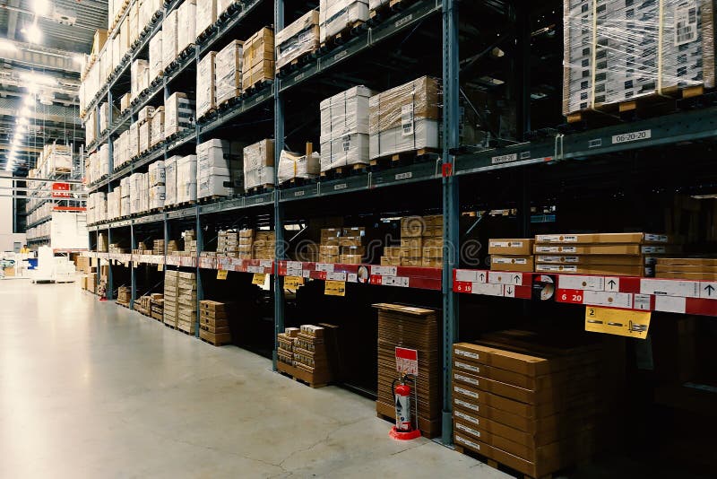 Large wharehouse with rows of shelves and goods boxes royalty free stock images Large wharehouse with rows of shelves and goods boxes royalty free stock images