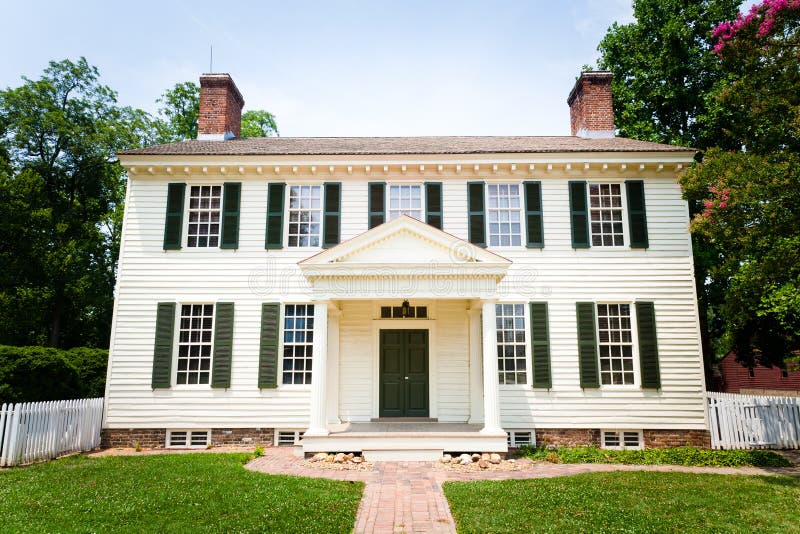 Large White Colonial Style Home stock images