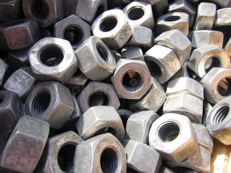 Large steel nuts stock photo. Image of construction 144169620