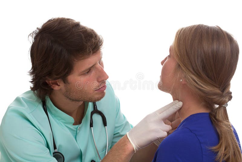 Laringologo che prova un collo della donna immagine stock Laringologo che prova un collo della donna immagine stock