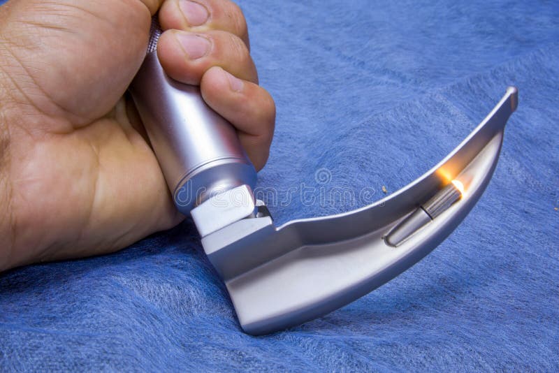 Laryngoscope for Intubation on a Blue Medical Cloth Stock Image Image