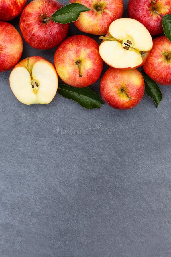 Las frutas de la fruta de la manzana de las manzanas slate rojo del formato de retrato del copyspace a fotografía de archivo Las frutas de la fruta de la manzana de las manzanas slate rojo del formato de retrato del copyspace a fotografía de archivo